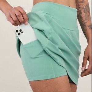 Athleta Salutation Skort Stash Pockets Pull On Built in Shorts Green Size XL